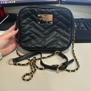 ***LIKE NEW*** Bebe crossbody clutch bag in black and gold